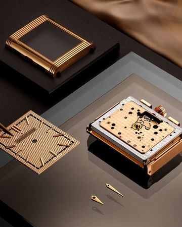 Savoir-Faire asset of the Jaeger-LeCoultre Reverso Tribute Chronograph Gold watch with a Watchmaker working on the dial - Q389256J