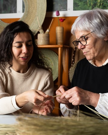 Jaeger-LeCoultre - Two women working on an art creation for the Homo Faber Fellowship