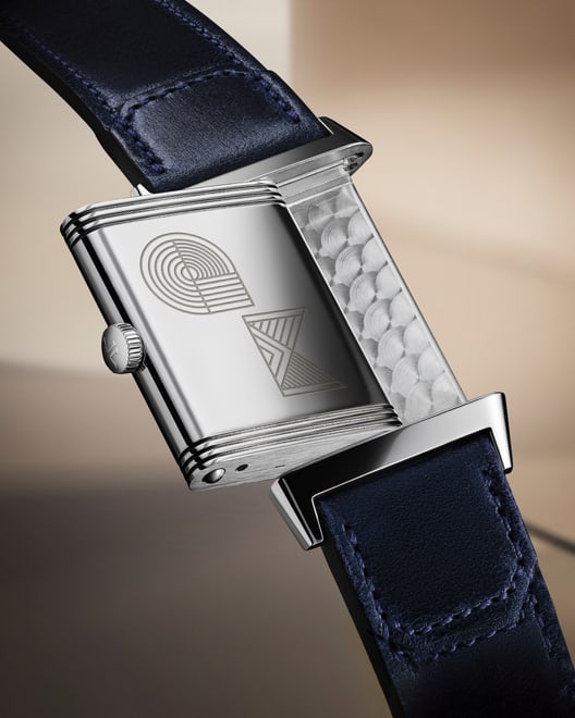 Levitation asset of the Jaeger-LeCoultre Reverso Tribute Monoface watch on its stainless steel side with a custom engraving with Trochut letters