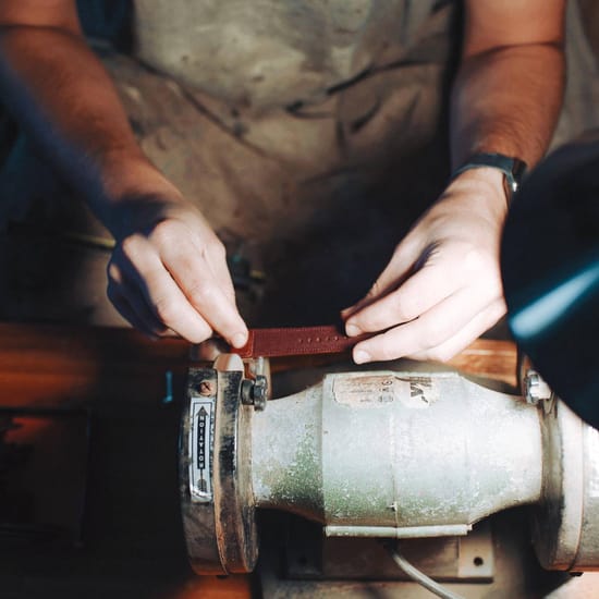 Craftmanship asset of a man crafting a Jaeger-LeCoultre casa fagliano strap for a luxury watch